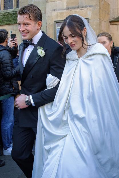 Adam Peaty and Holly Ramsey leaving Bath Abbey after their wedding.
