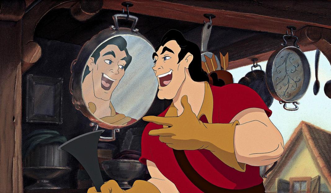 Illustration of Gaston looking at his reflection in a mirror.