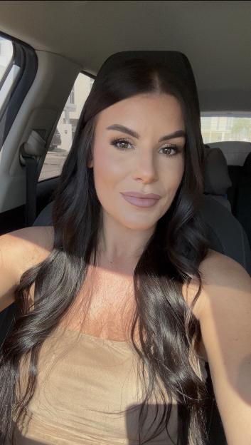 Poppy Owen in her car.