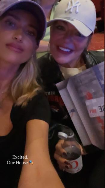 Two women smiling for a selfie.