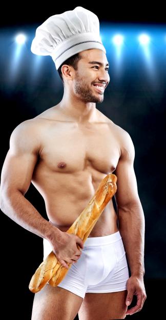 A muscular man wearing a chef's hat and white underwear, holding a baguette.