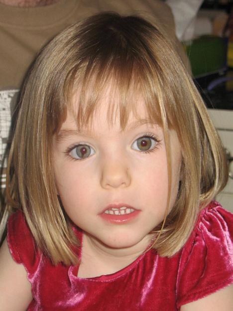 Madeleine McCann, a missing girl with shoulder-length blonde hair and a red velvet top, looks at the camera.