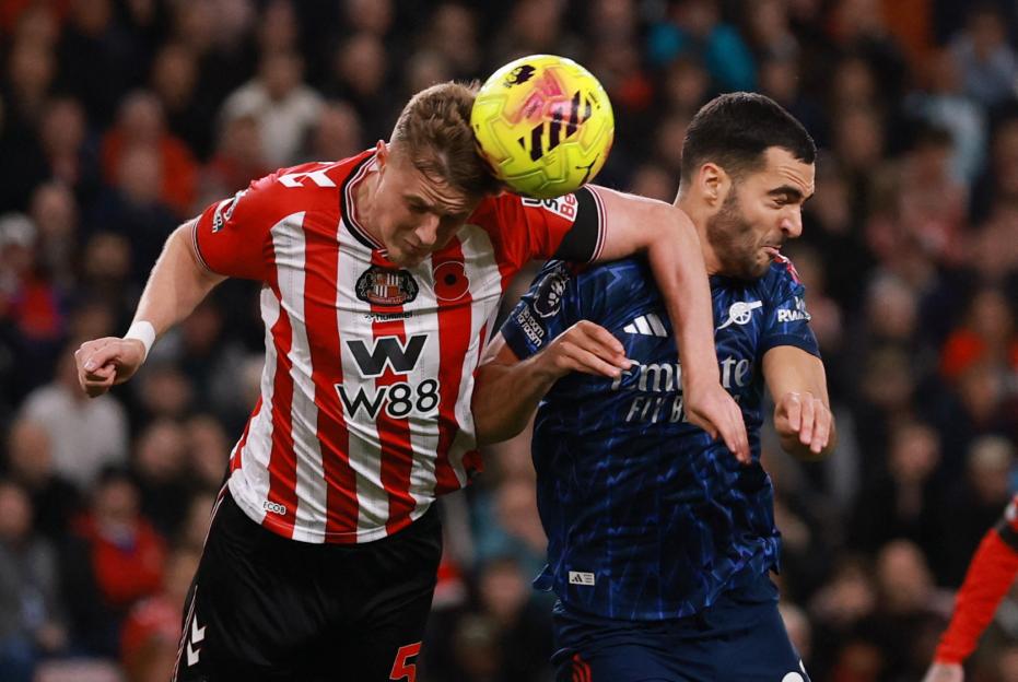 Arsenal's Mikel Merino Faces Urgent Medical Care for Head Injury as Fans Call for Red Card