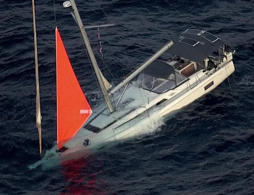 Shocking moment 52ft yacht sinks after being attacked by gang of 8 whales leaving crew stranded in sea