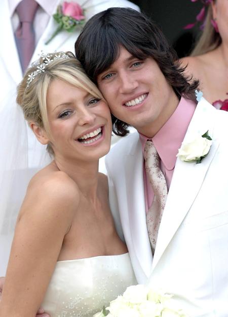 Tess Daly and Vernon Kay smiling at their wedding.