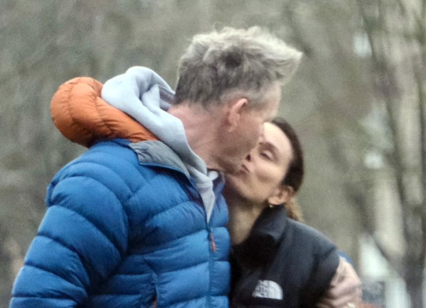 Gordon Ramsay and his wife, Tana, embrace and kiss while walking in South West London.