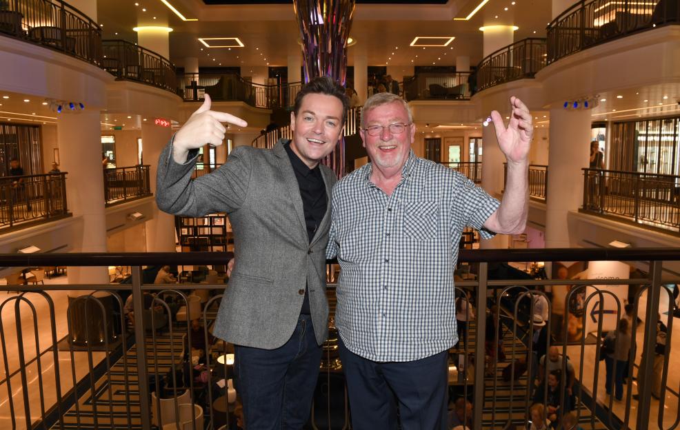 Television personality Stephen Mulhern and his father Christopher Mulhern on board P&O Cruises ship Britannia.