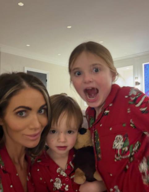 Amy Childs with her kids in matching pajamas