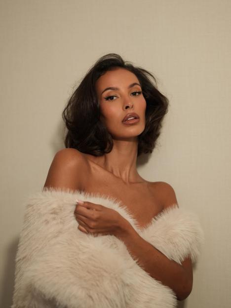 Maya Jama Dazzles in Figure-Hugging White Dress at Brit Awards, Then Turns Heads in a Bold Nude Pose with a Fur Stole