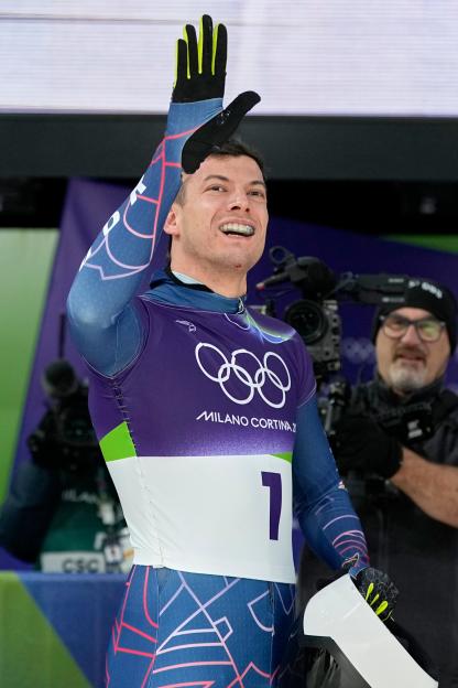 Matt Weston reacts at the finish of a men's skeleton run during the 2026 Winter Olympics.