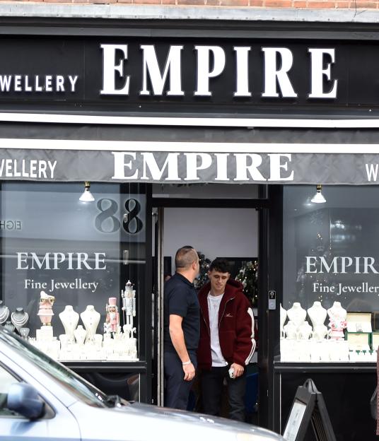 Man City Footballer Phil Foden dumps his car on double yellow lines, as he goes ring shopping with Fiancee Rebecca Cooke, as she rocks a Cat Slater lepoard print tracksuit in Wilmslow Cheshire