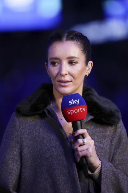 Laura Robson, a former tennis player and commentator, holding a Sky Sports microphone.