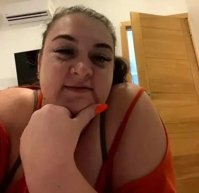 A woman in a red top with the text, "You didn't like me when I was broken..."