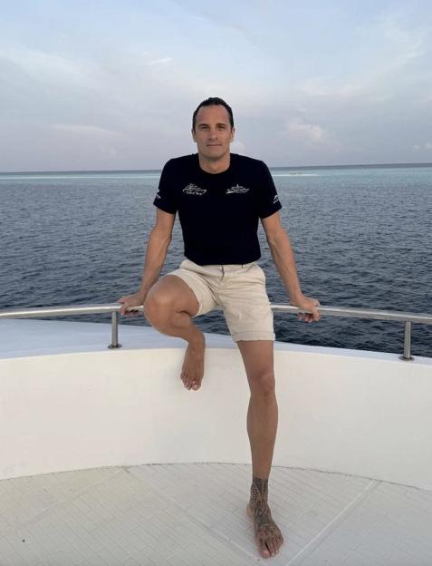 Diving instructor Gianluca Benedetti on a boat in the Maldives.