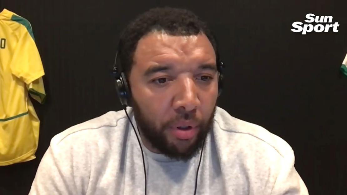 Troy Deeney wearing headphones during an interview with Sun Sport.