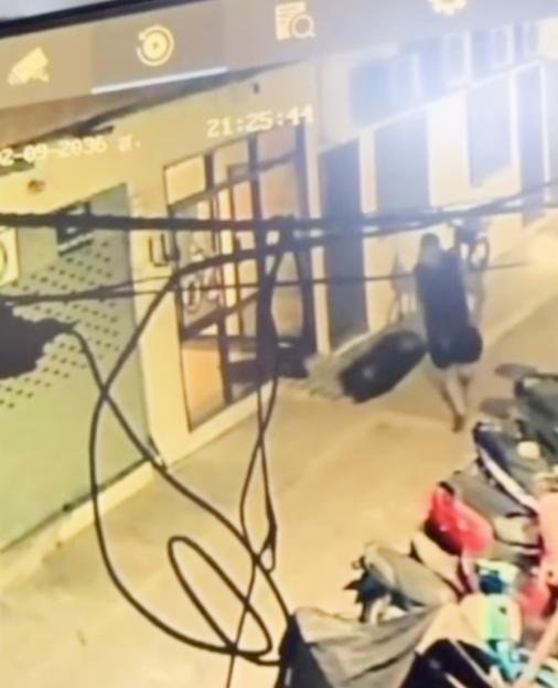 Chilling CCTV shows Aussie tourist 'carrying suitcase with dead Thai girl, 17, stuffed inside'