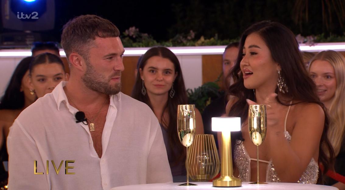 A man and a woman talking on Love Island.