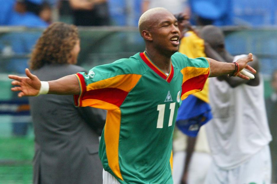 Senegal's forward El Hadji Diouf celebrates after