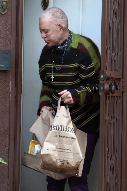 *PREMIUM-EXCLUSIVE* *MUST CALL FOR PRICING BEFORE USAGE* First Look! A bald & unrecognizable Mickey Rourke is spotted at the home he is reportedly being evicted from.