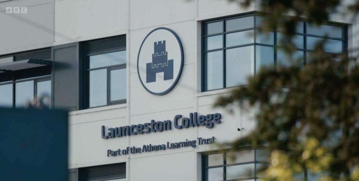 The Launceston College building with its logo.