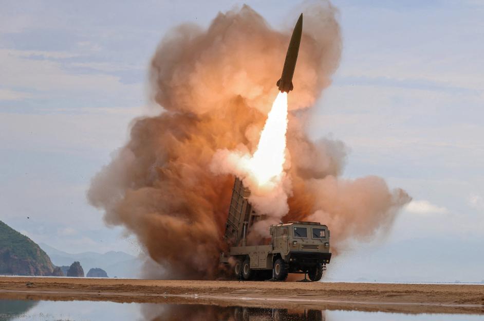 : North Korean leader Kim oversees weapons tests