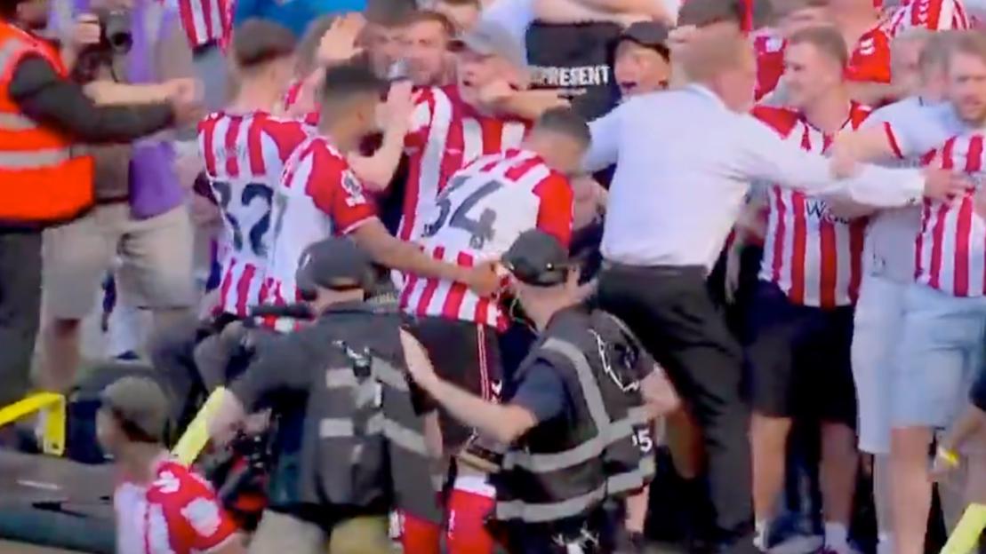 'Premier League Stadium Chaos: Advertising Board Collapses, Security Evacuates Fans'