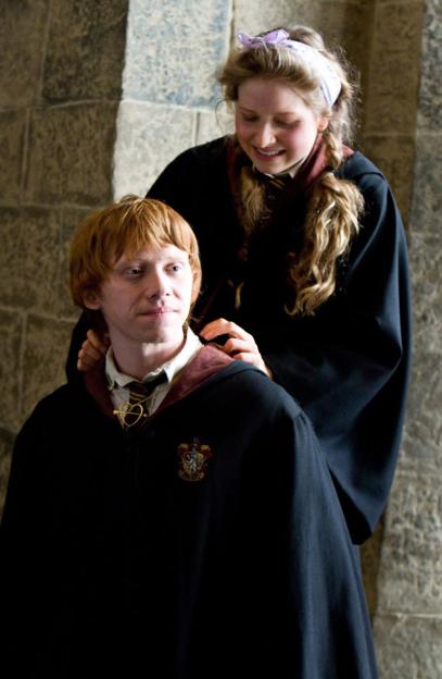 Rupert Grint as Ron Weasley and Jessie Cave as Lavender Brown in Harry Potter and the Half-Blood Prince.