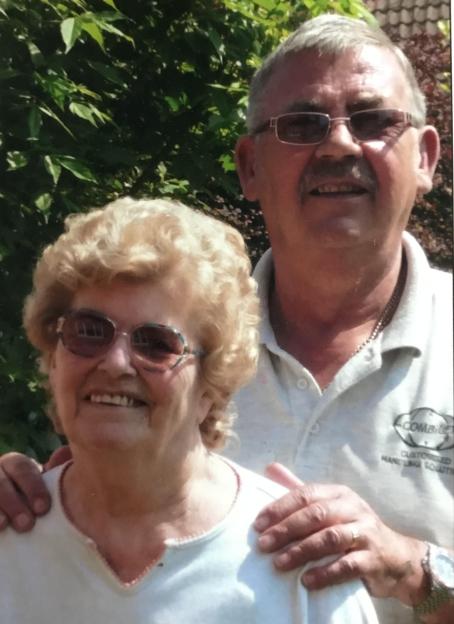 June and Peter Buffham smiling together.