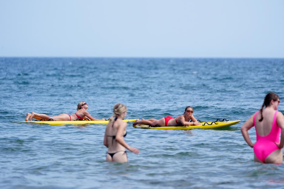 Lifeguards monitoring people in the sea at King Edward's Bay.