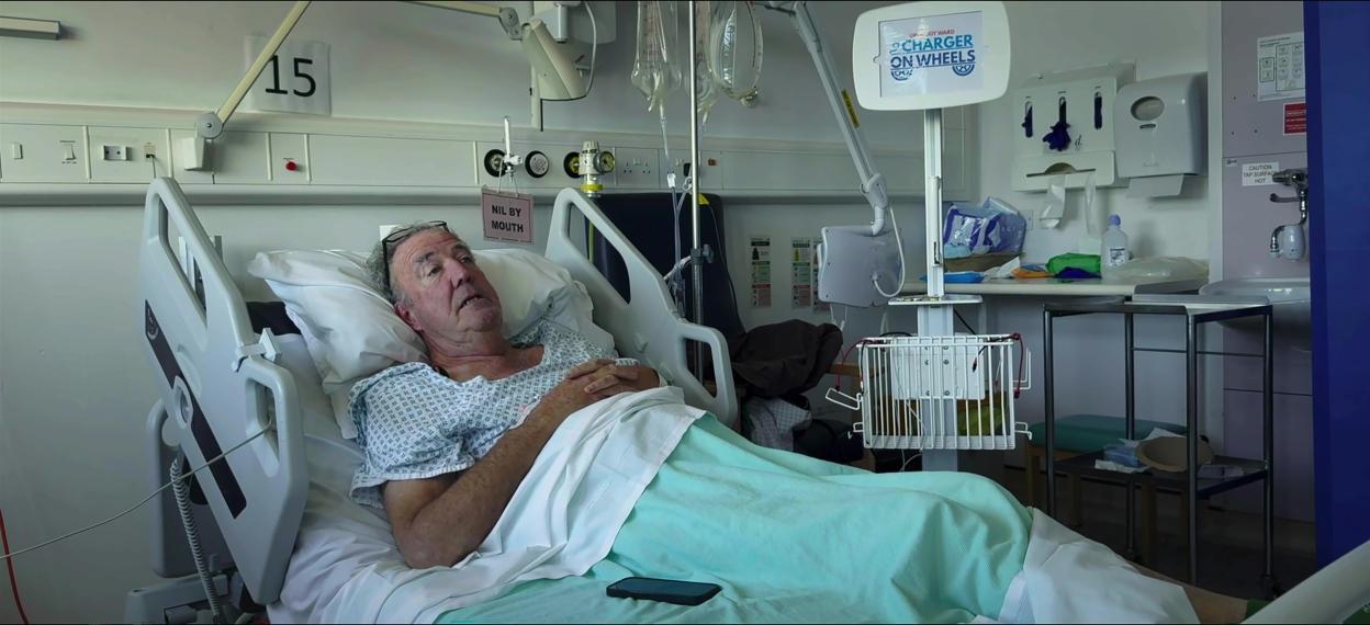 Jeremy Clarkson lying in a hospital bed.