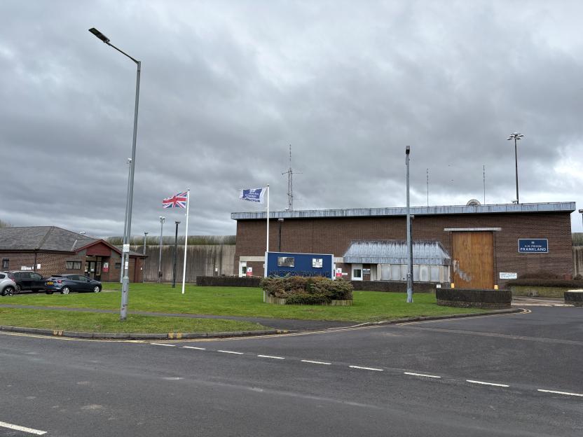 HMP Frankland prison in County Durham, United Kingdom, seen from an exterior road.