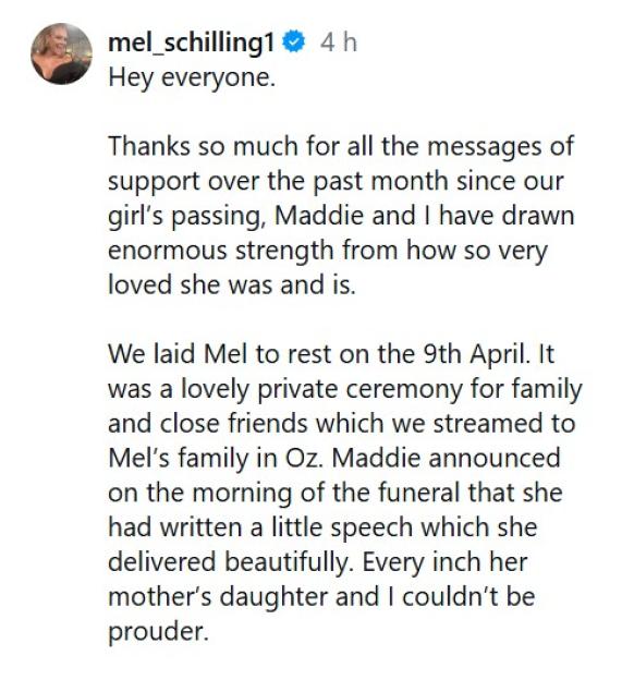 Mel Schilling with her husband and daughter embracing by a Christmas tree.