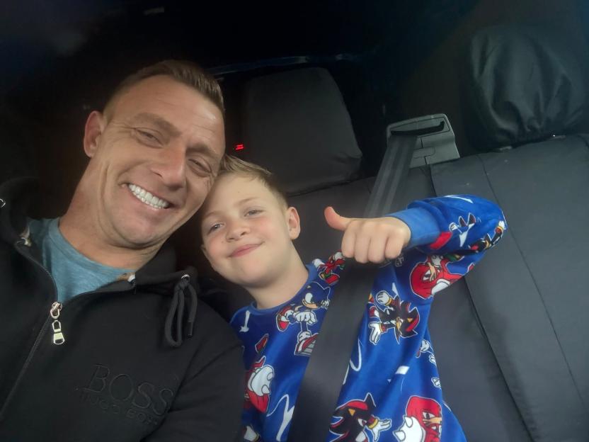 Brit dad builds own 'mini waterpark' by installing huge WATERSLIDE from garage to garden