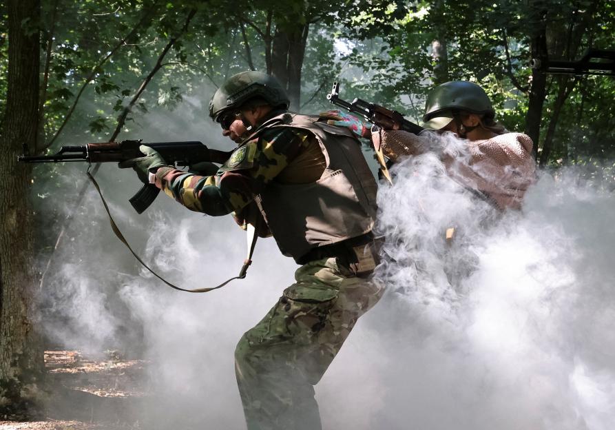 Ukrainian civilians take part in military training in Kharkiv region