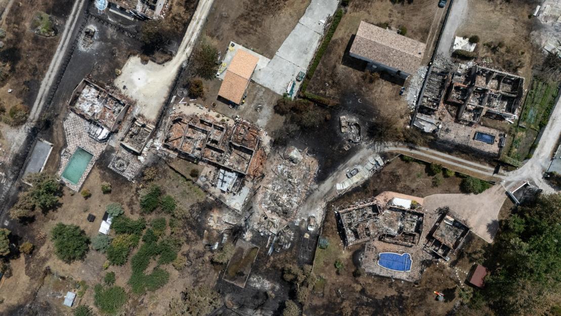 Aerial view of homes destroyed by wildfires.