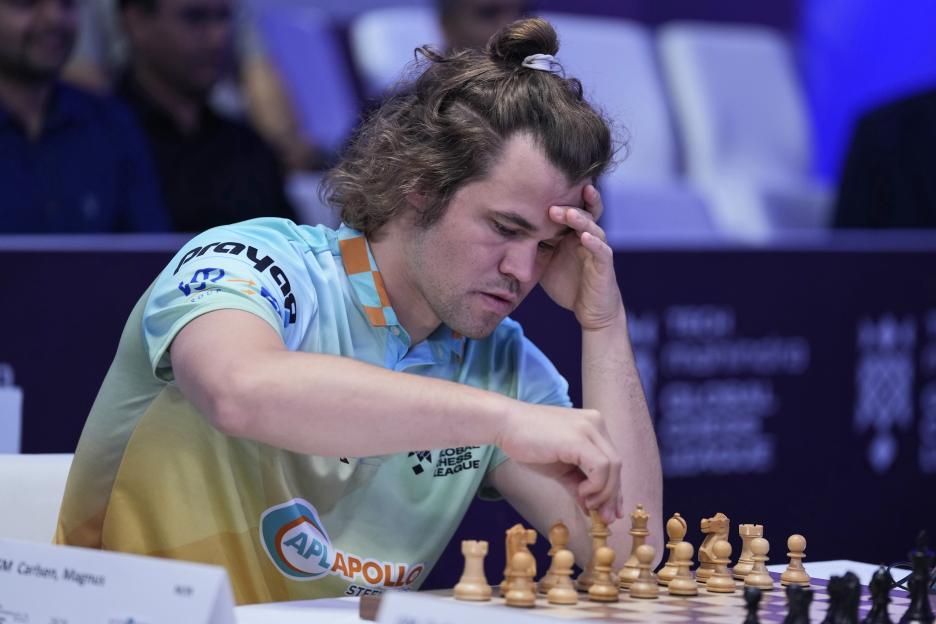 FILE - Norwegian Magnus Carlsen of SG Alpine Warriors plays against Poland's Jan-Krzysztof Duda of Chingari Gulf Titans during Global Chess League in Dubai United Arab Emirates, on July 1, 2023. Th...