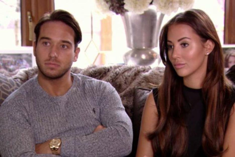 James Lock and Yazmin Oukhellou from TOWIE, seated and looking off to the side.