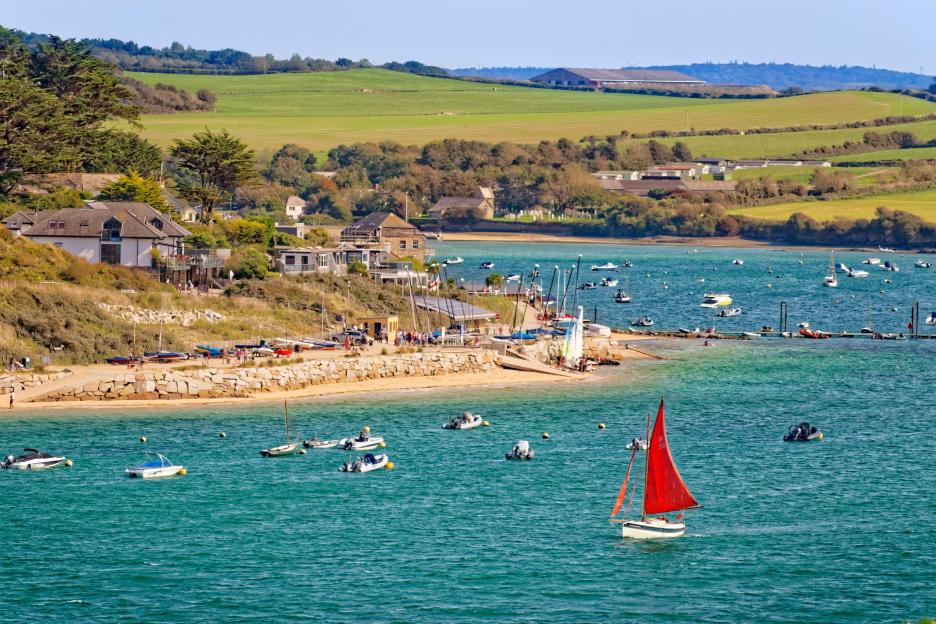 Rock village waterfront on the River Camel estuary, North Cornwall, England.