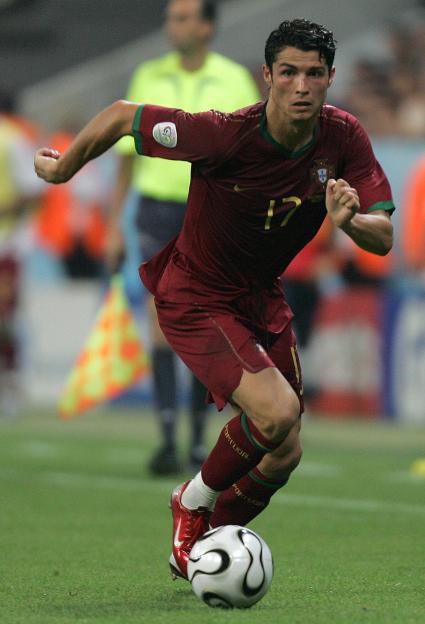 Cristiano Ronaldo dribbles a soccer ball during a World Cup semifinal match.
