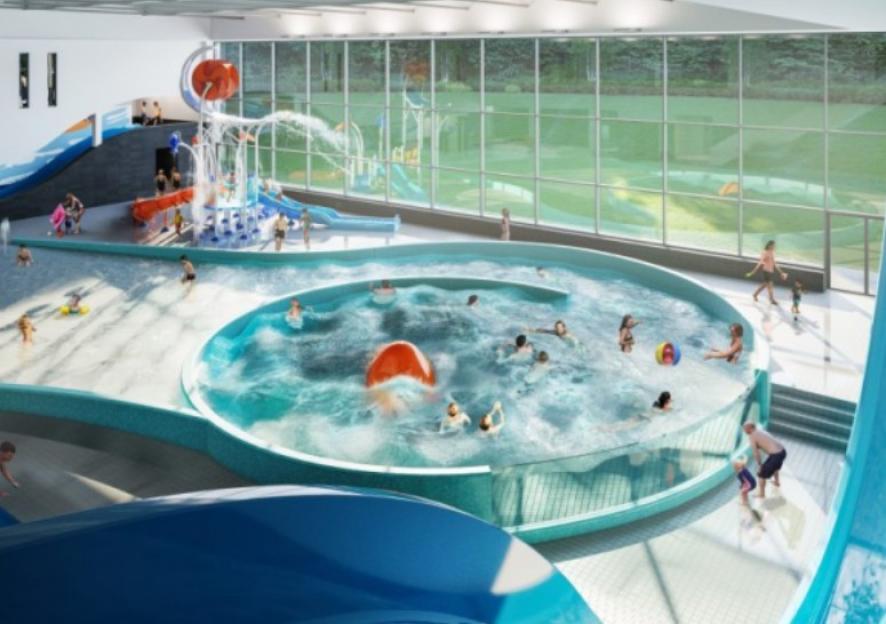 Illustration of an indoor water park with multiple pools and slides, filled with people.