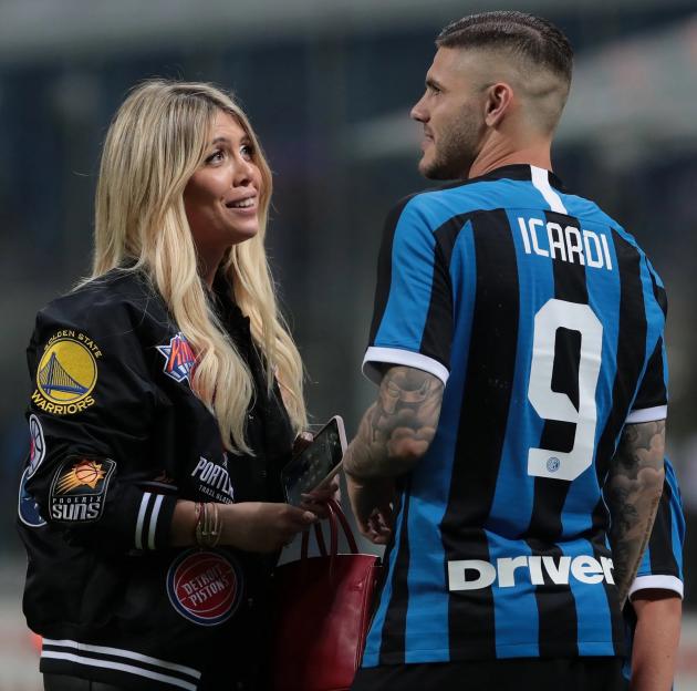 Mauro Icardi of FC Internazionale speaks with his wife Wanda Nara after a match.
