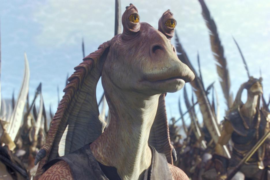 Jar Jar Binks with other Gungans behind him.