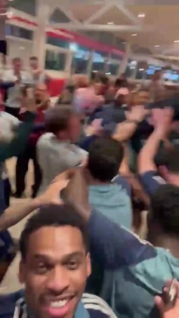 Check Out the Epic Moment Arsenal's Transfer Guru Crowd Surfs During Premier League Title Celebration!
