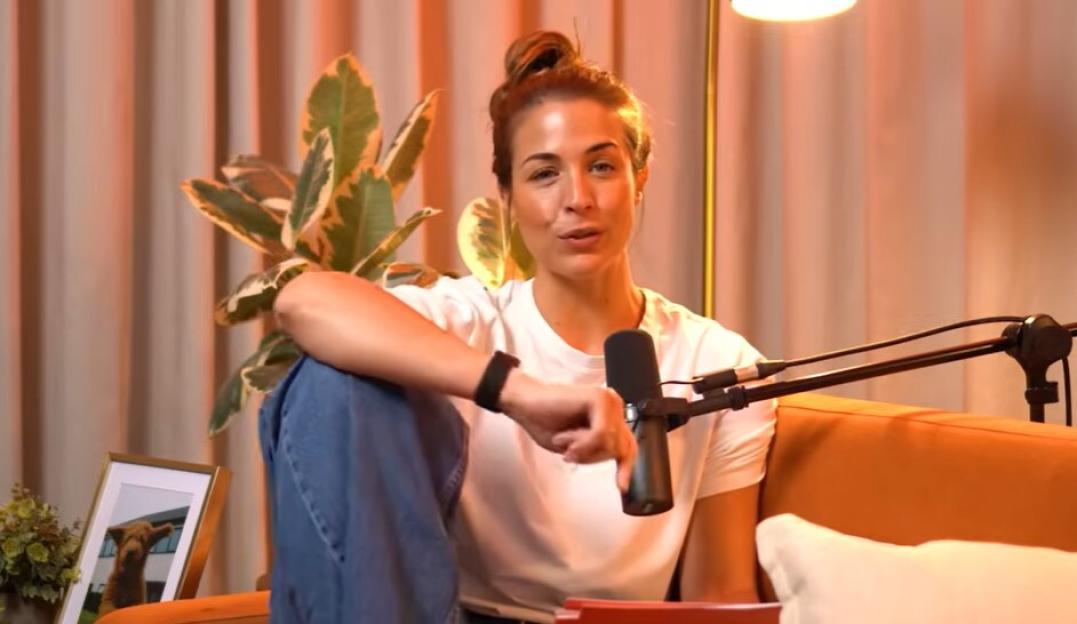 Gemma Atkinson speaking into a microphone.