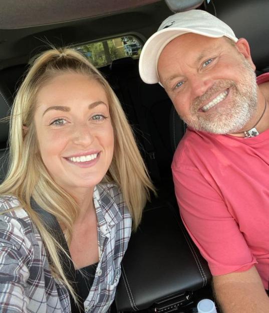 Mariah Gardner with a man in a car.