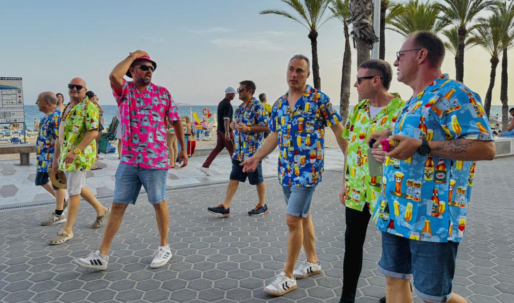 British holidaymakers in Benidorm, Spain, discuss changes to the benefit system.