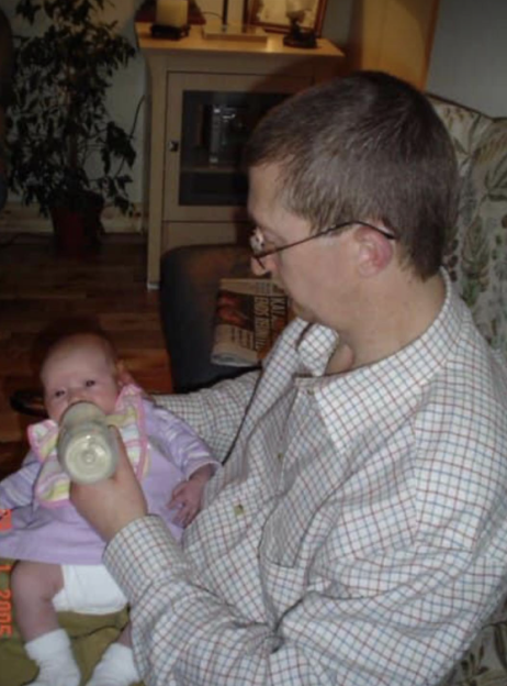 William 'Pat' McCormick feeding his daughter Morgan as a baby.