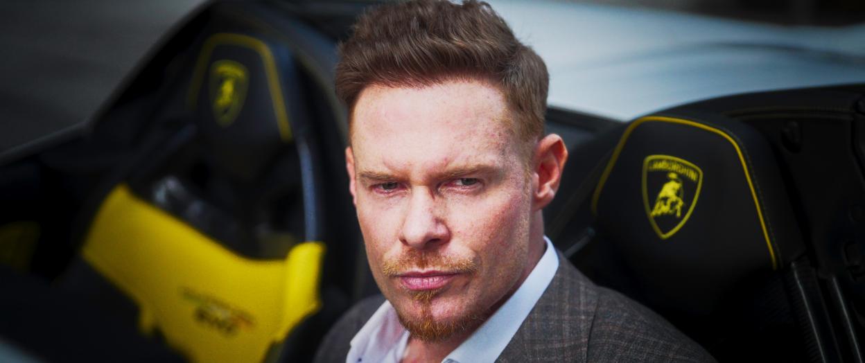 Justin Waller in a Lamborghini, featured in the documentary "Louis Theroux: Inside the Manosphere."