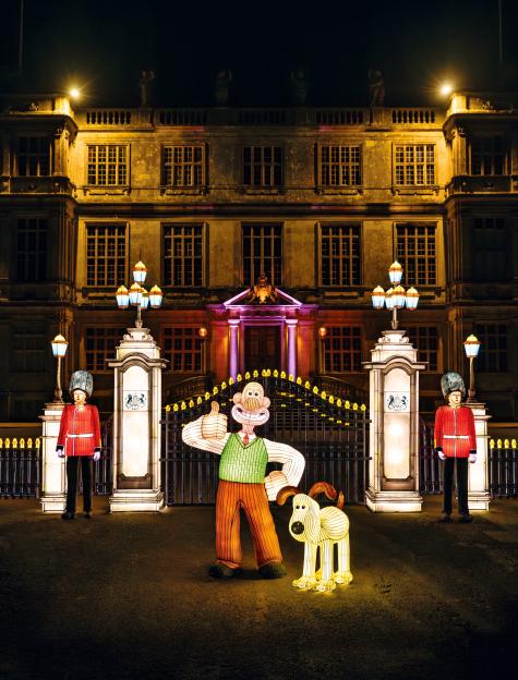 Longleat Festival of Light featuring glowing Wallace and Gromit lanterns in front of a grand estate.
