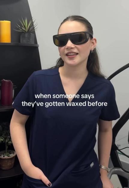 A woman wearing sunglasses and blue scrubs says, "when someone says they've gotten waxed before."